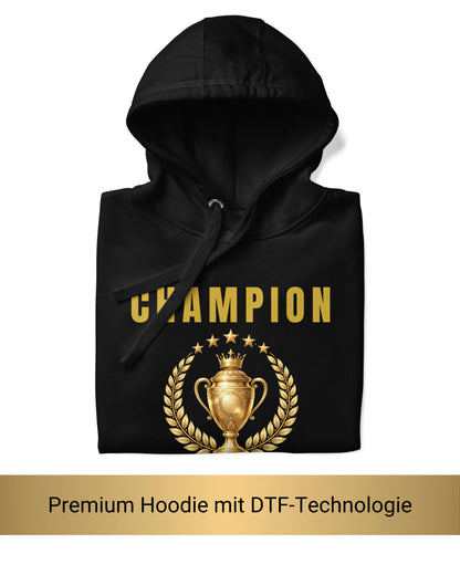 Zusammengefalteter schwarzer Champion Hoodie mit goldenem DTF-Premium-Druck – Detailansicht